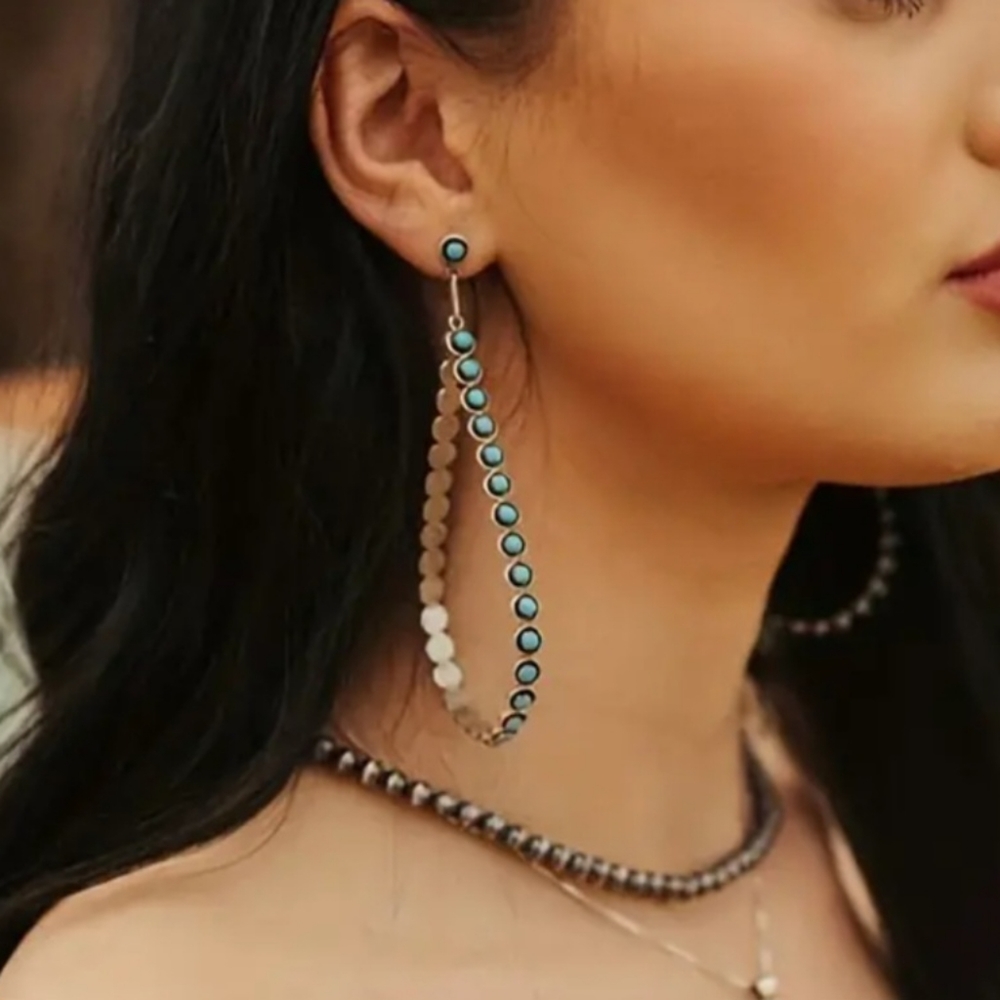 Earrings with tourquoise colored beads  Stunning!